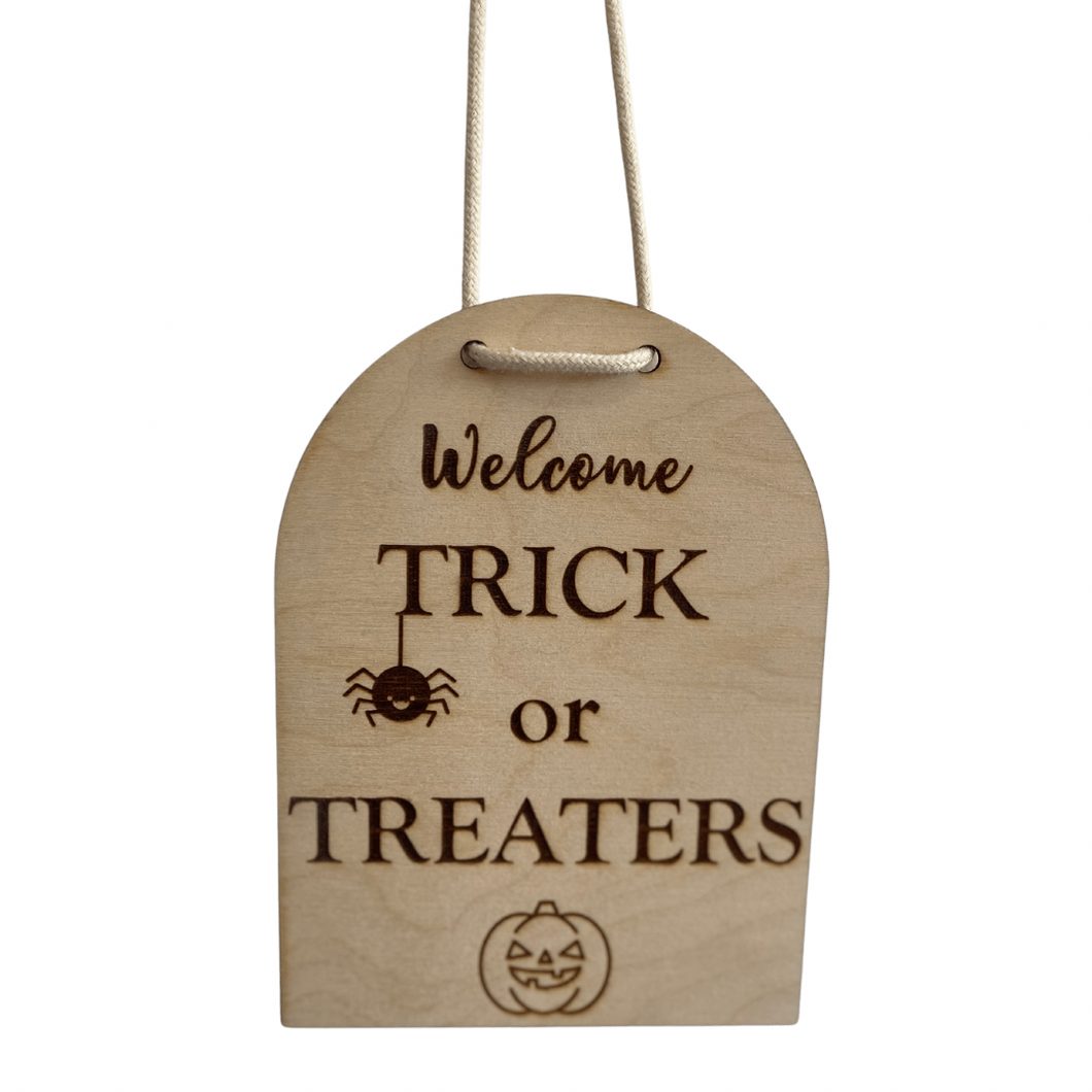 halloween trick or treaters door sign